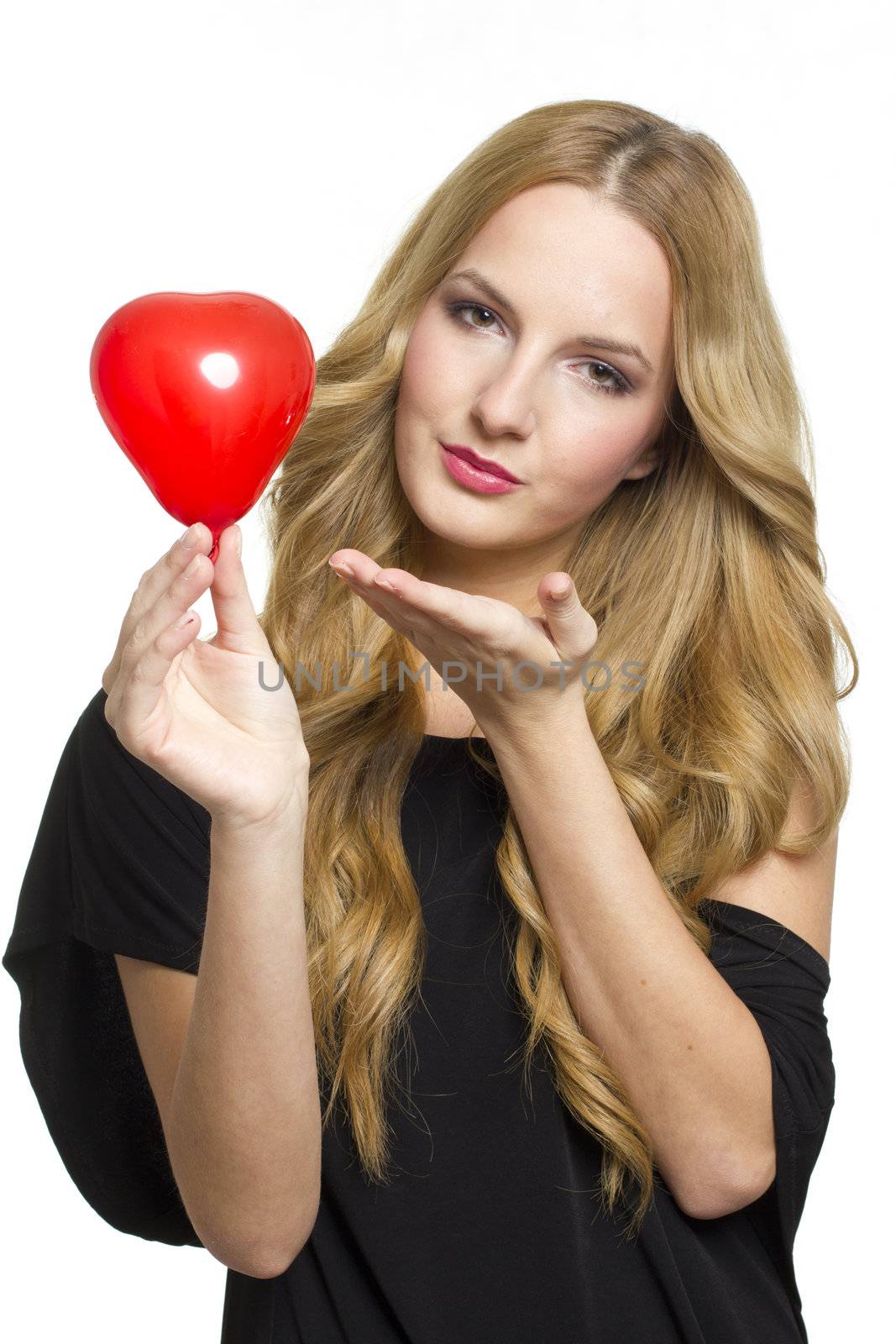 Young woman holding red heart in valentine's day, on white background
