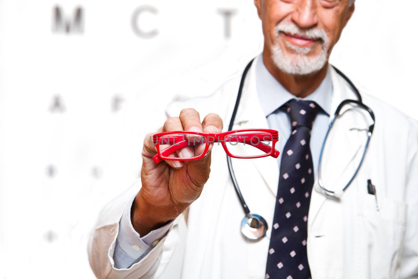 senior ophthalmologist on white background