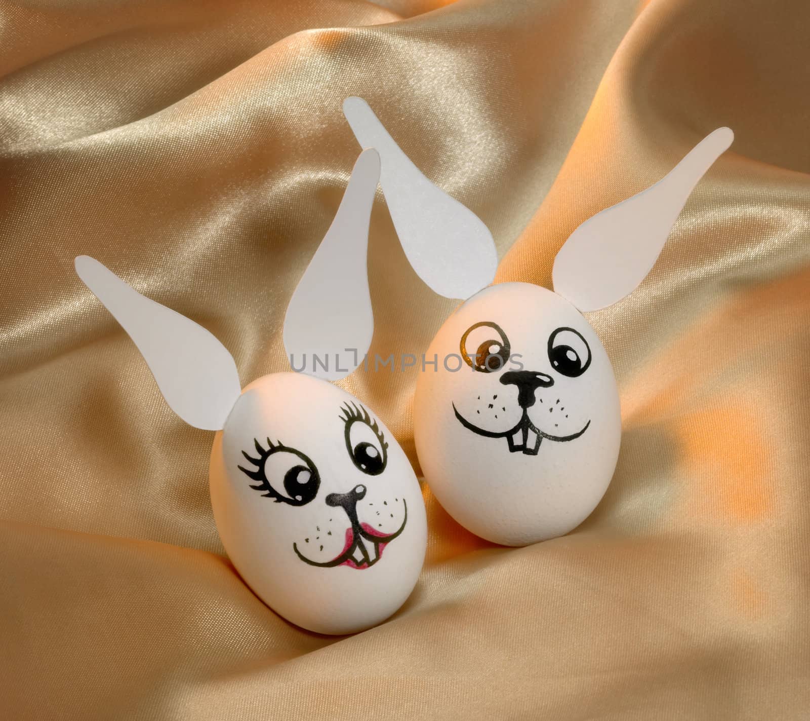 easter bunny eggs in golden satin back
