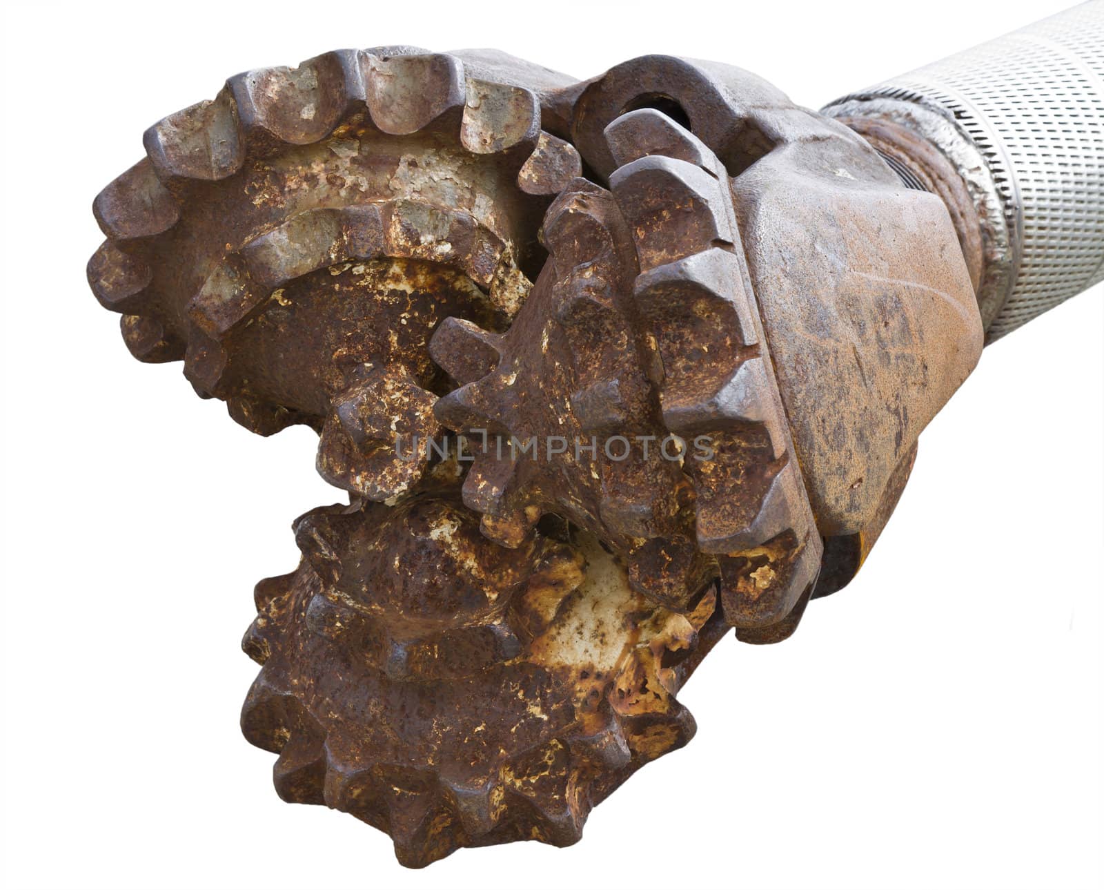 Worn out 3-cone drilling bit isolated in white background
