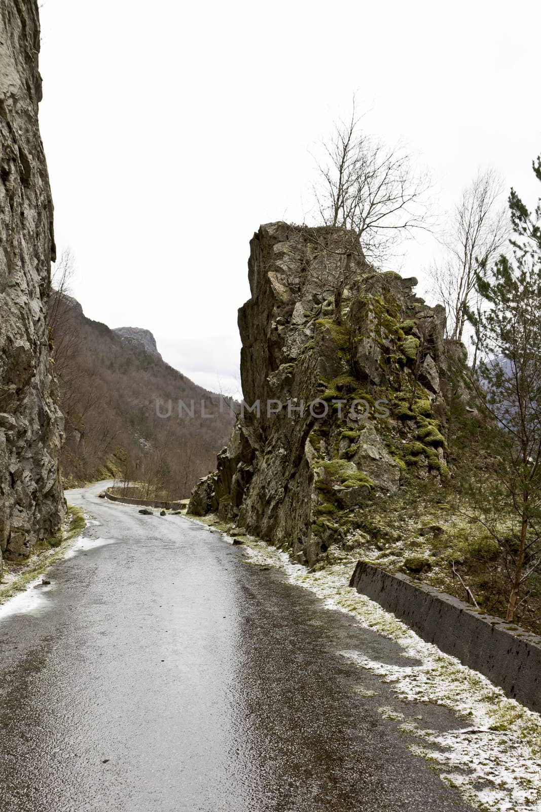 unused, run-down road in rural landscape - norway