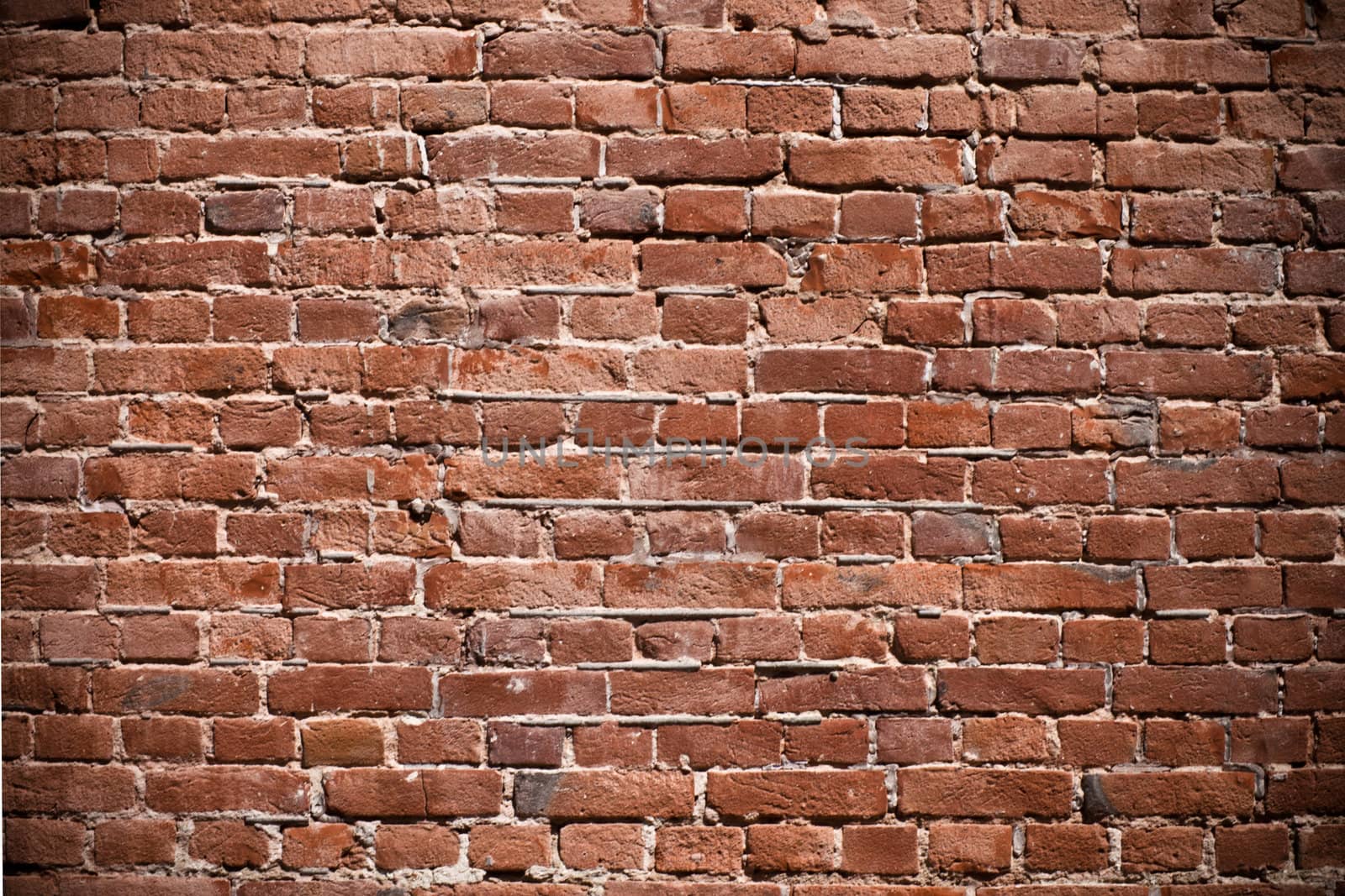 Background of red old brick wall texture