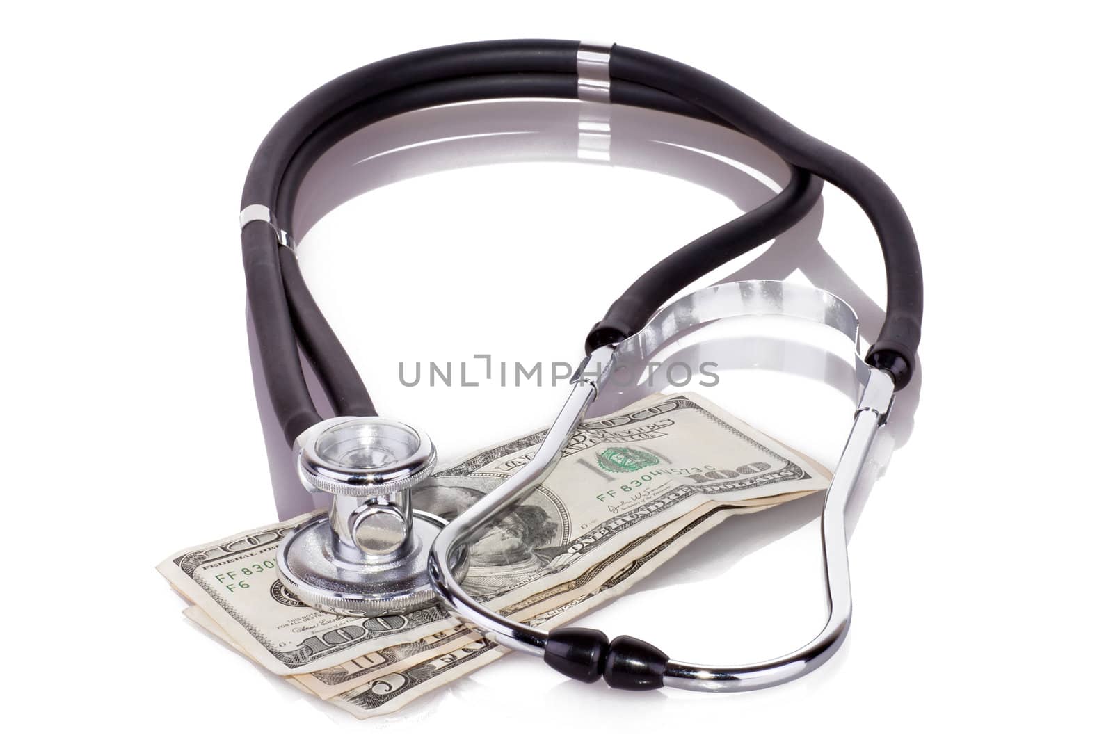 stethoscope on dollars by georgenightingale