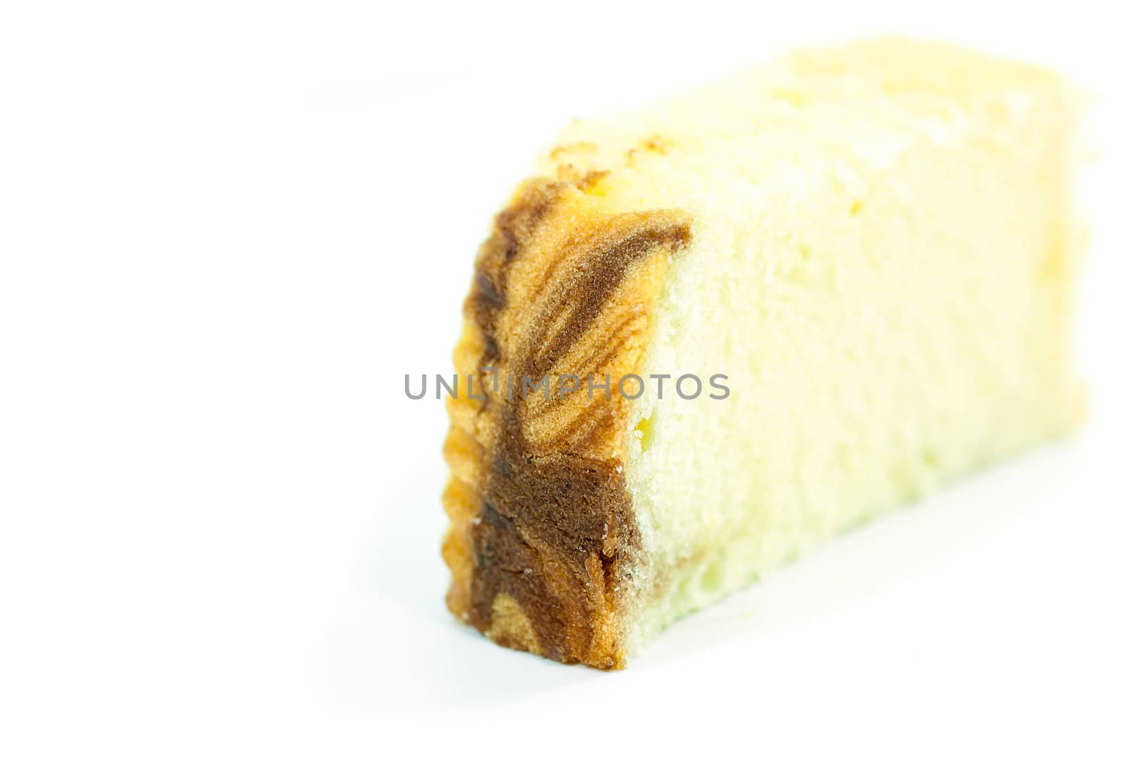 Butter cake slices on white background by moggara12