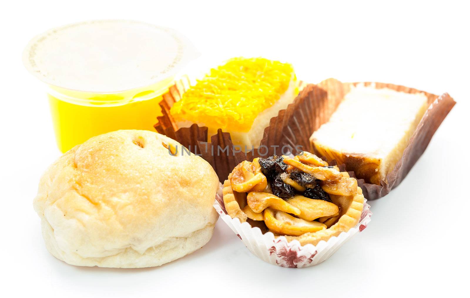 bakery dessert  with orange juice on white background isolated