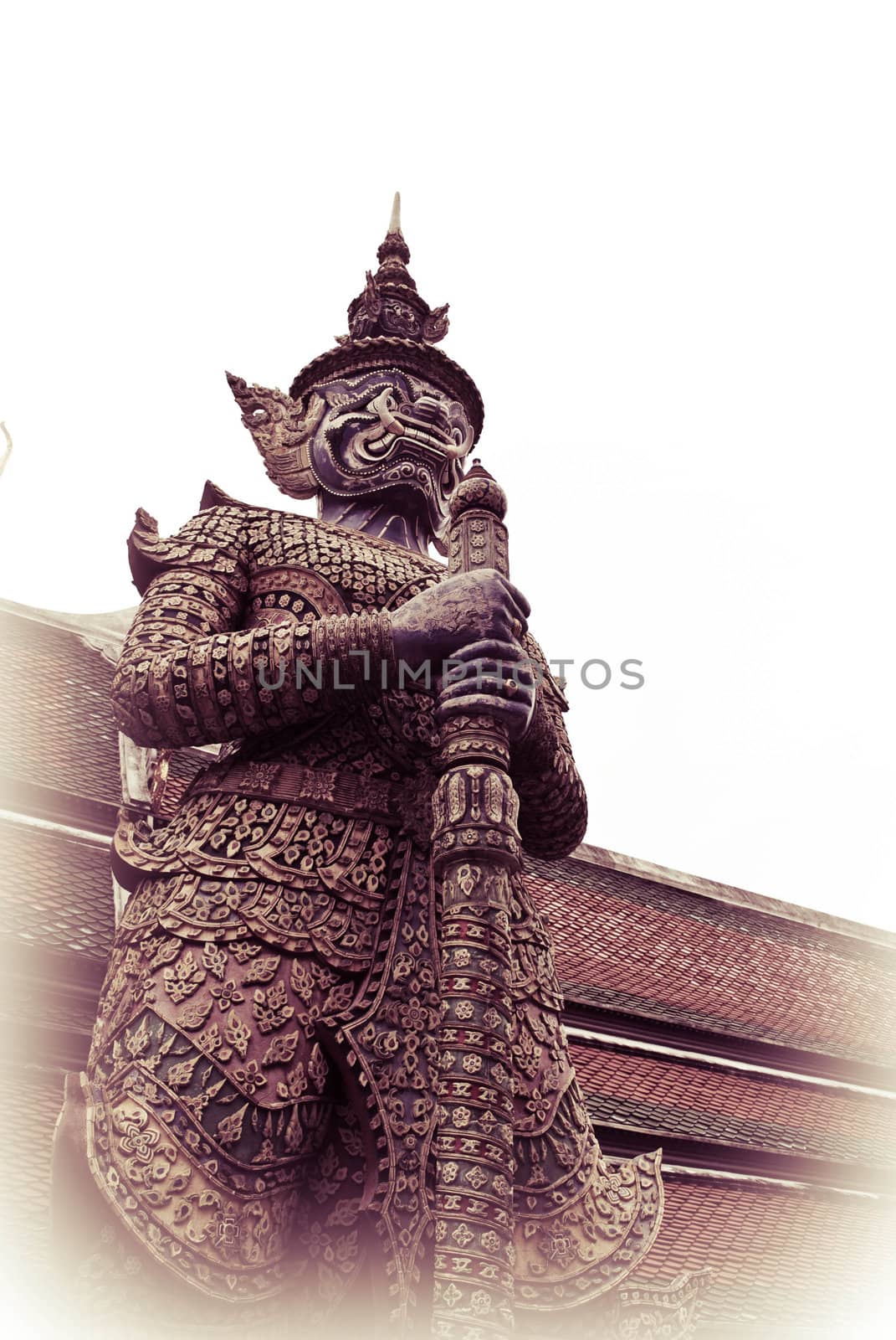 Ancient giant sculpture of The Emerald Buddha temple in Bangkok, Thailand