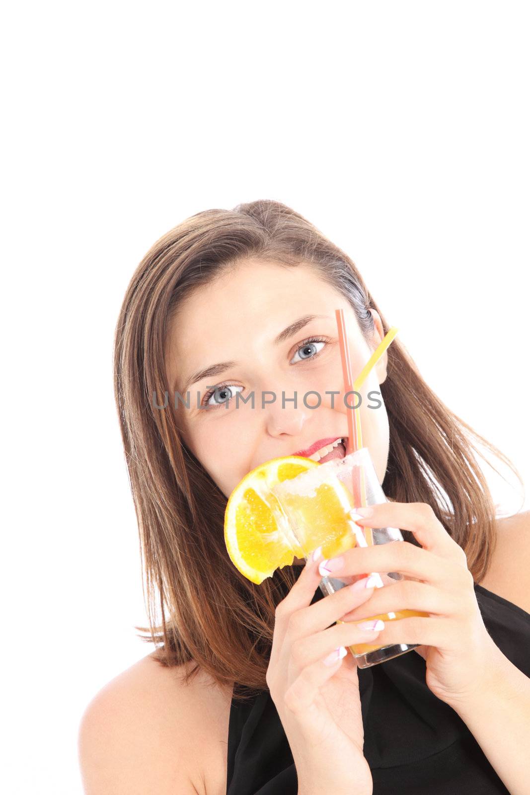 Merry party girl in a black halter neck holding an almost empty glass of tropical orange cocktail in her hands Merry party girl in a black halter neck holding an almost empty glass of tropical orange cocktail in her hands