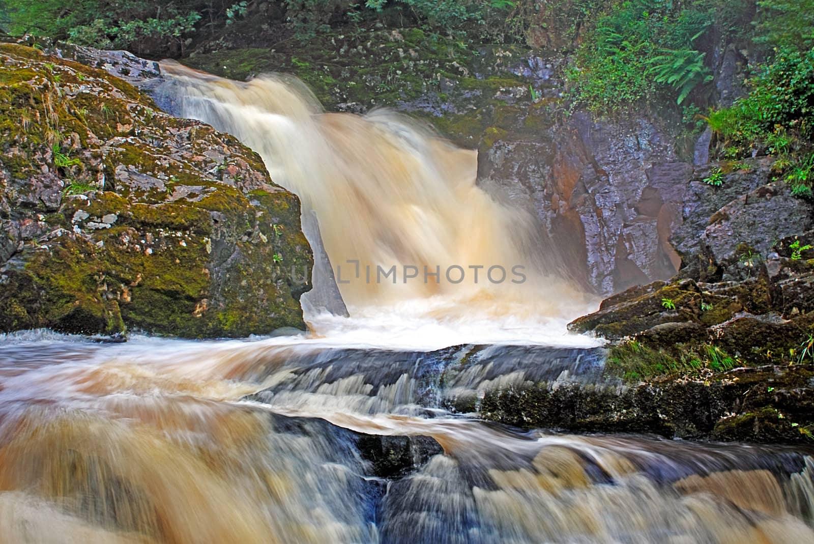 Snow Falls on the River Doe near Ingleton in Yorkshire, England.