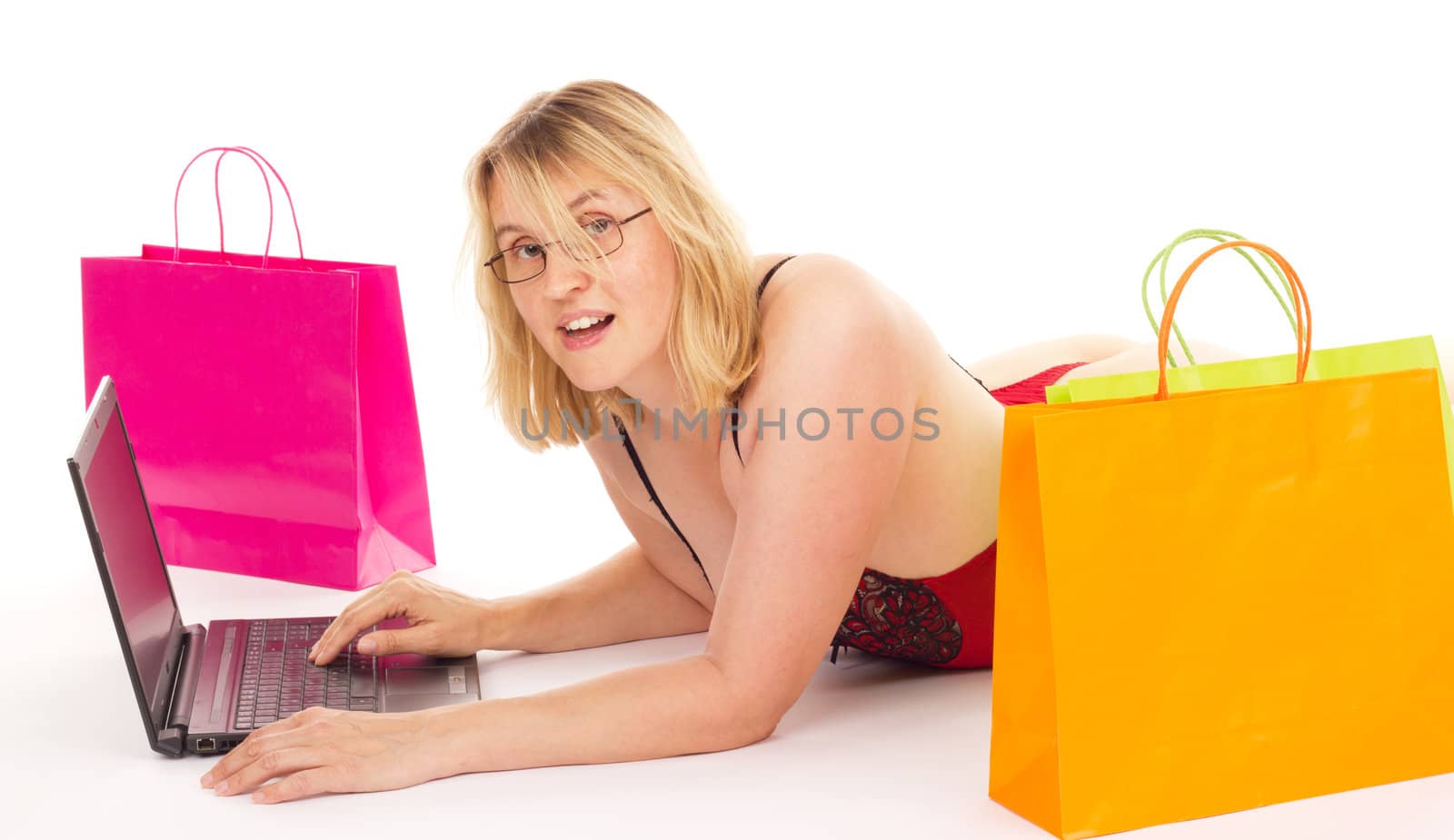 Attractive woman shopping over the internet by gwolters