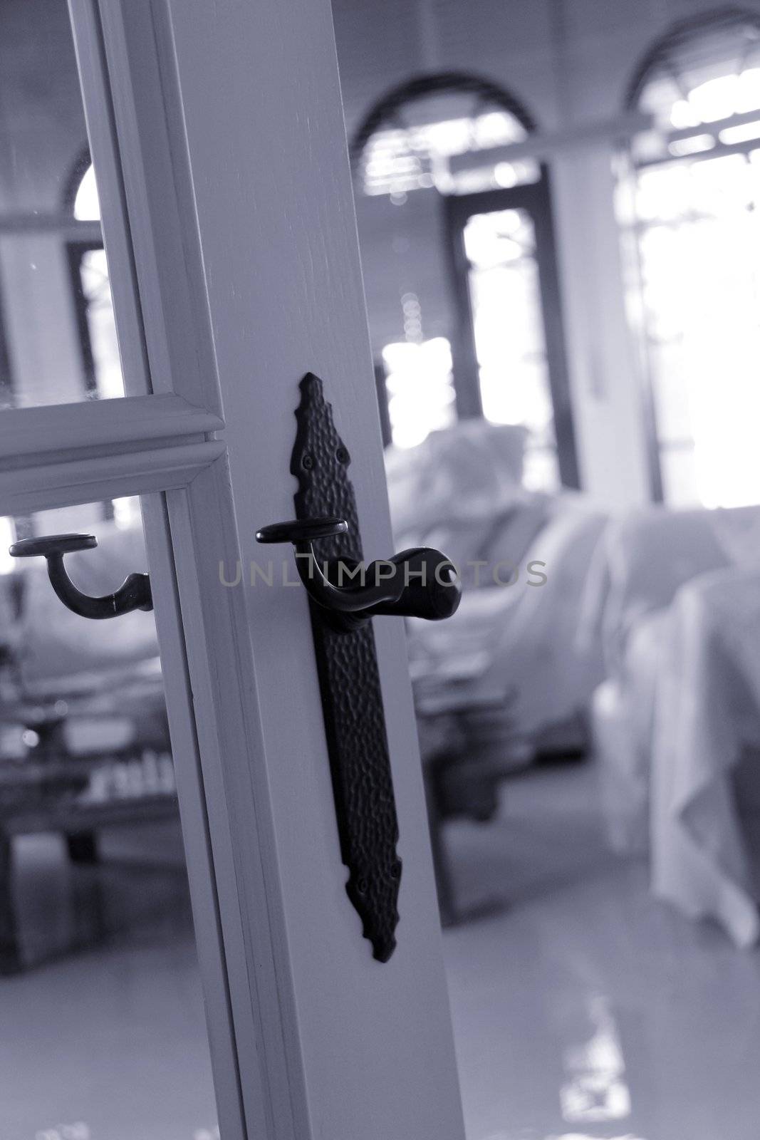 old black doorhandle in a luxury villa