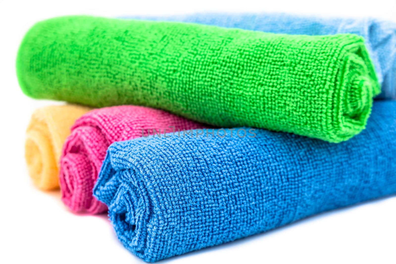 Colorful towels on a white background