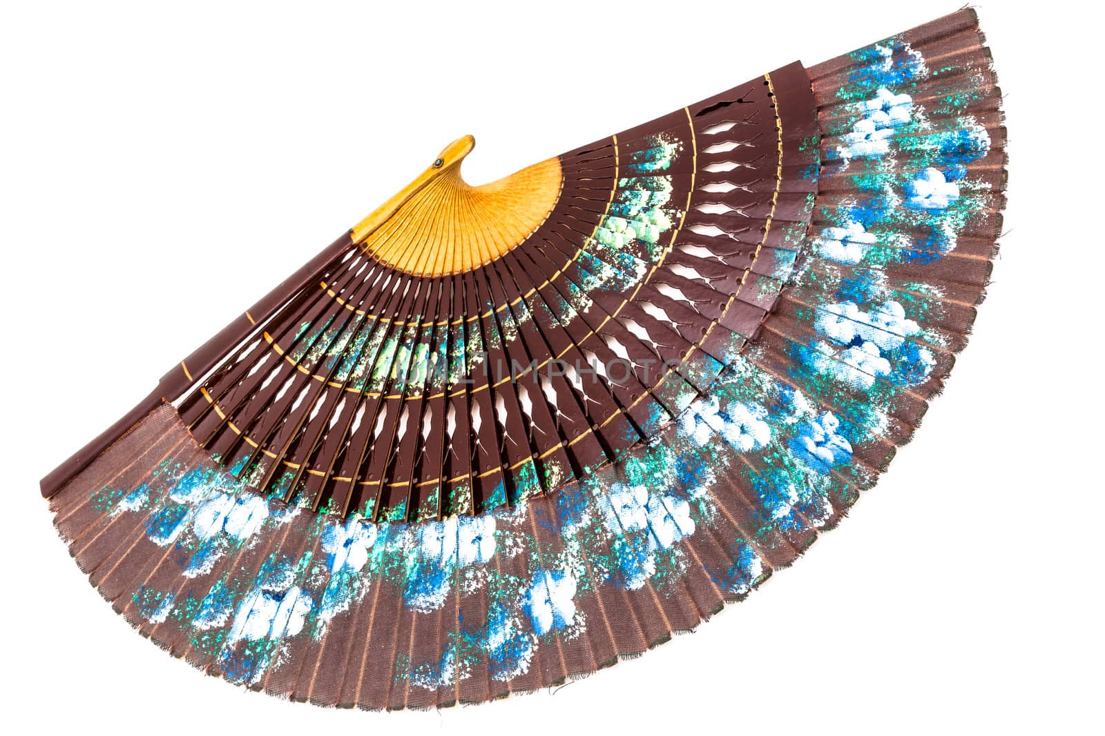 A beautiful spanish fan on a white background