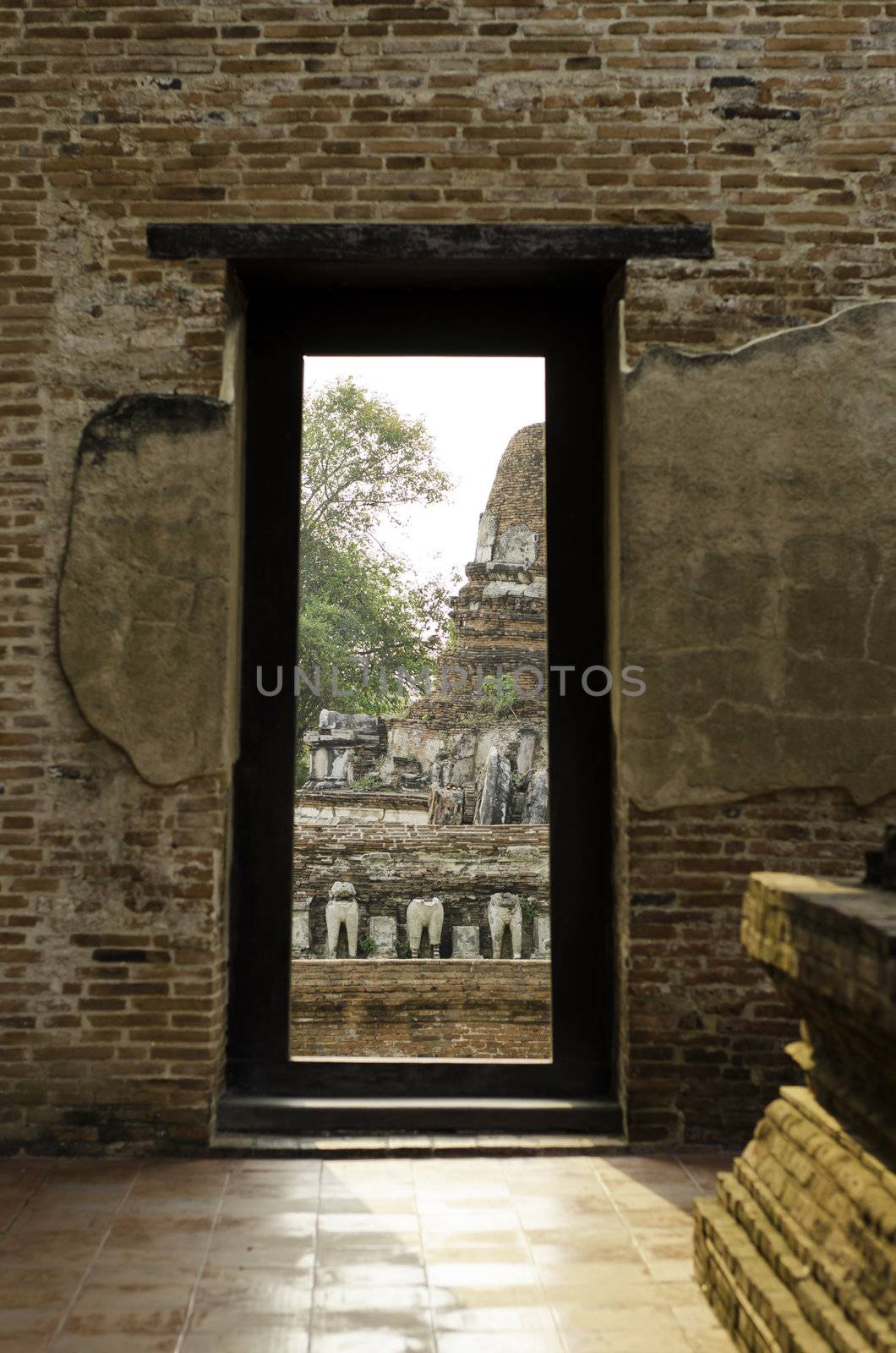 Gate at Wat Maheyong, Ancient temple and monument in Ayutthaya,  by siraanamwong