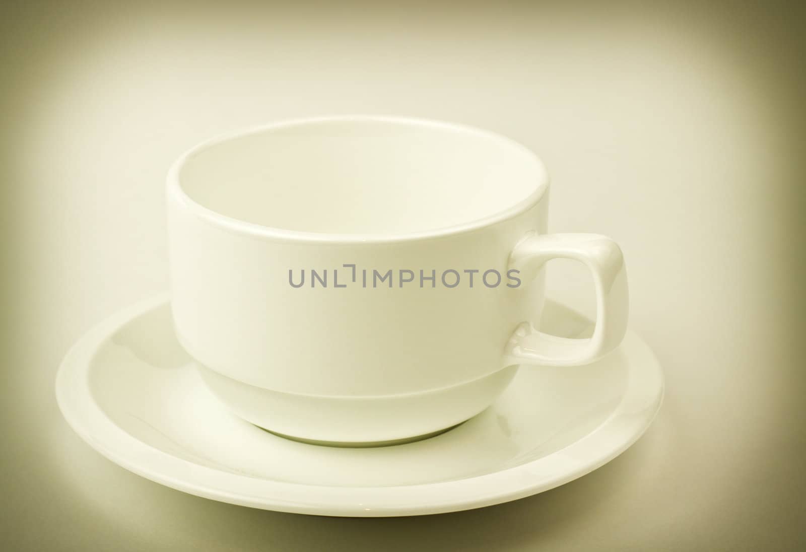 fine retro style image of white cup for coffee or tea