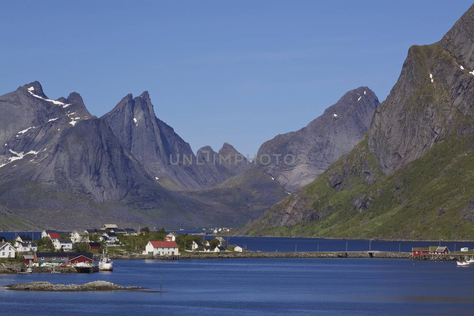 Picturesque fishing town of Reine by the fjord on Lofoten islands in Norway