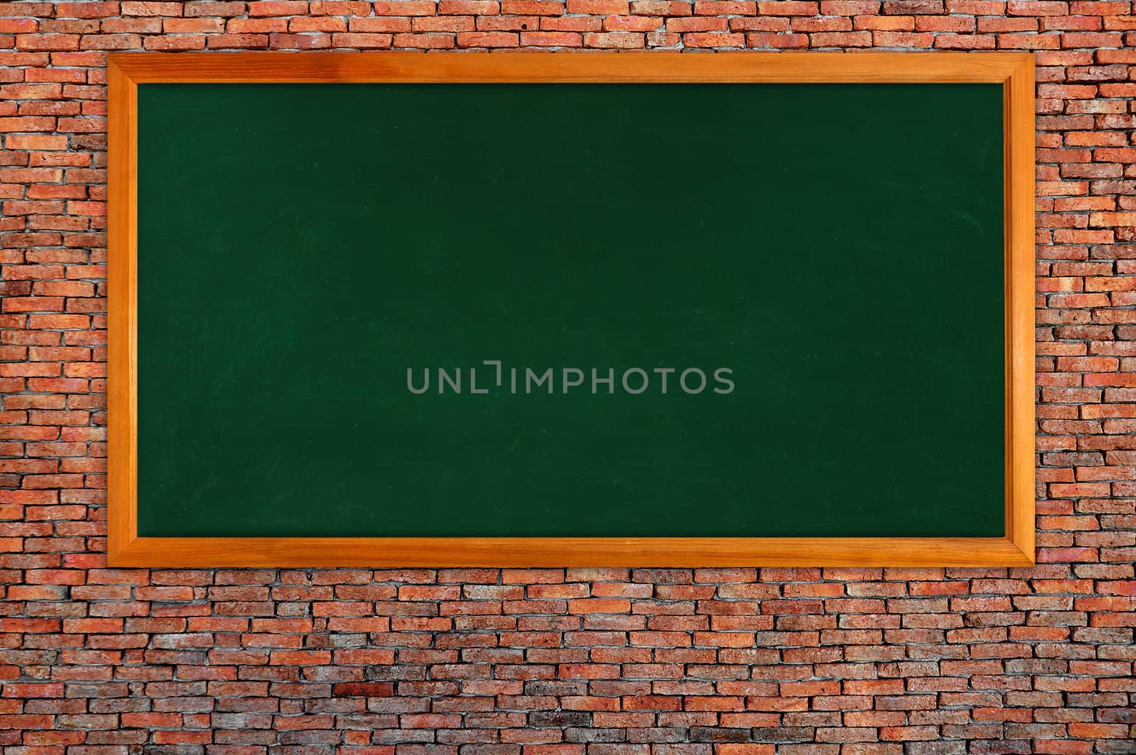blackboard on brick wall
