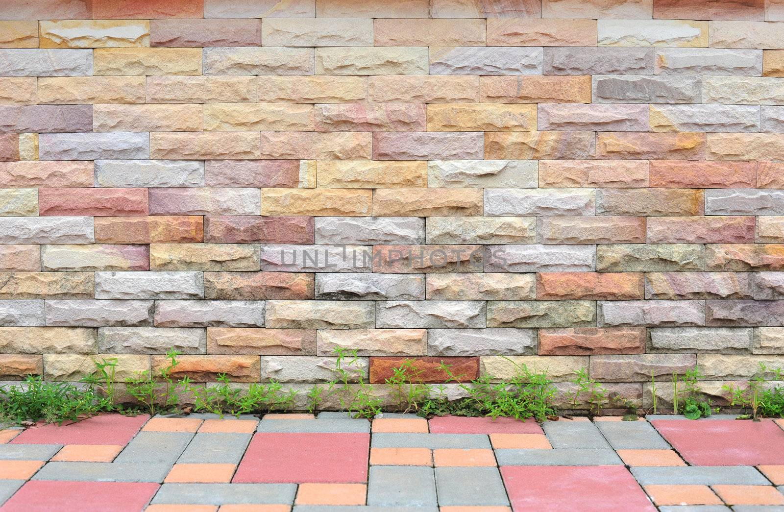 brick wall with sidewalk