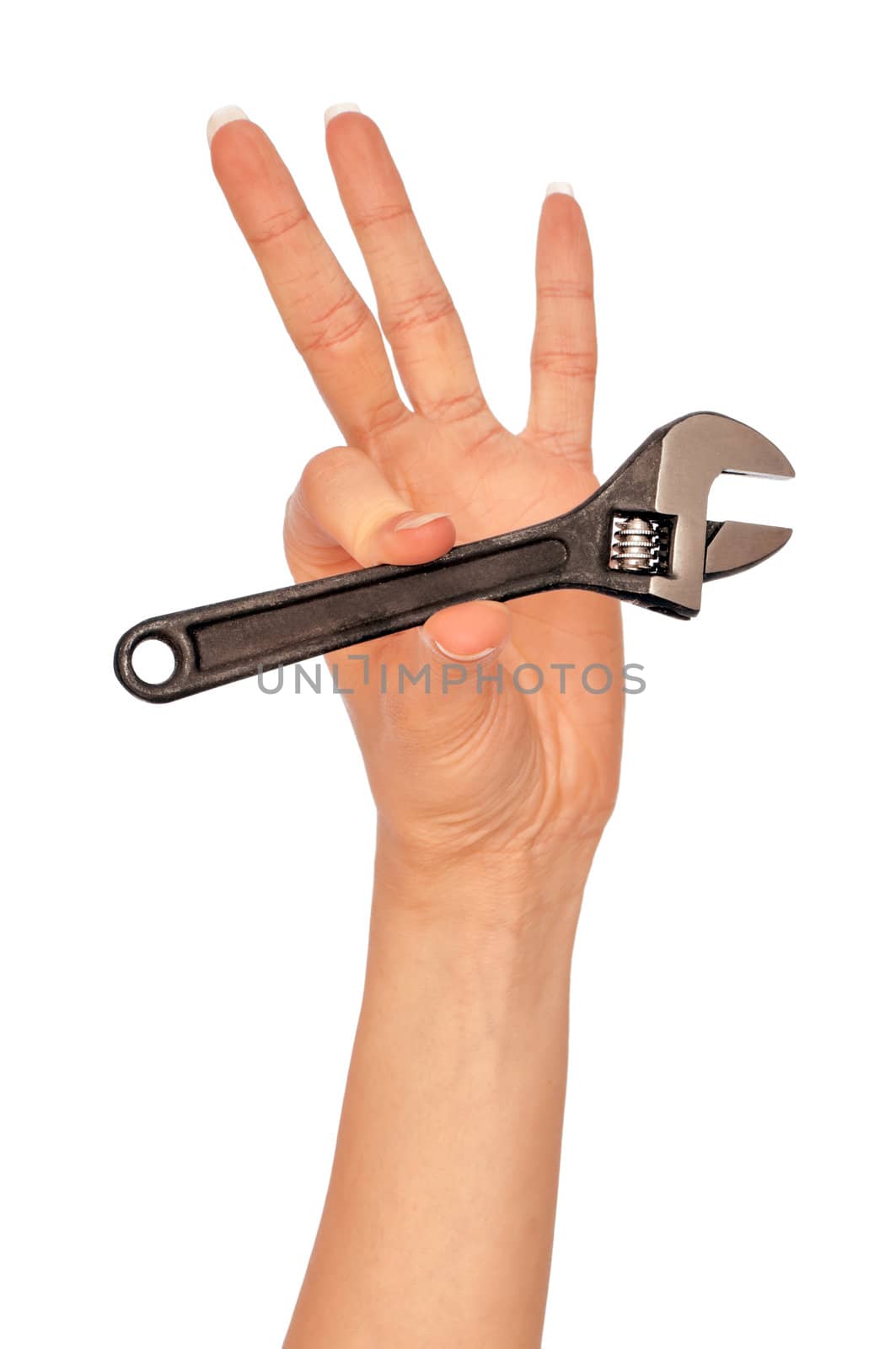 woman holding small chrome vanadium adjustable spanner in the hand
