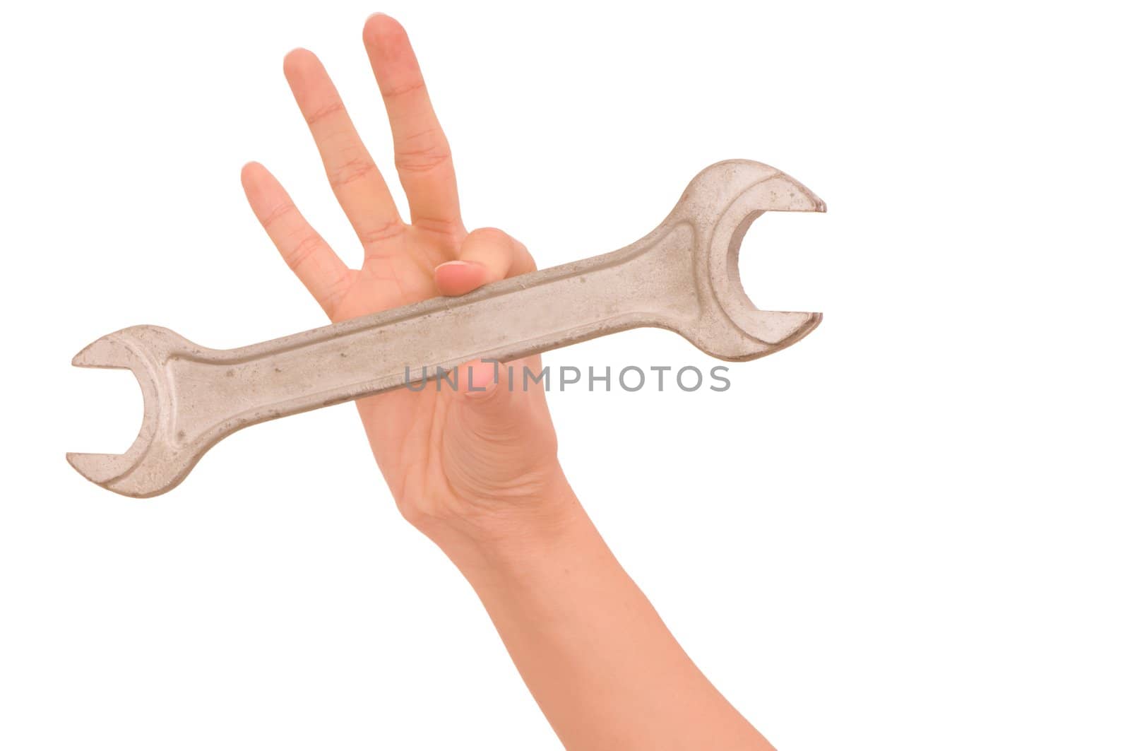woman holding big chrome vanadium spanner in the hand
