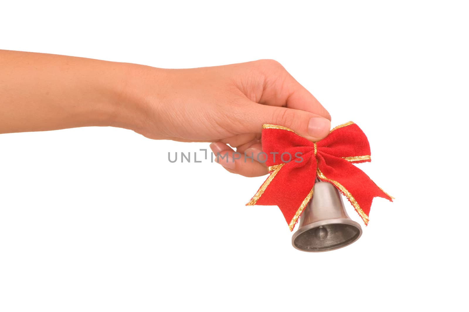 hand bell with red bow in the woman's hand for ringing