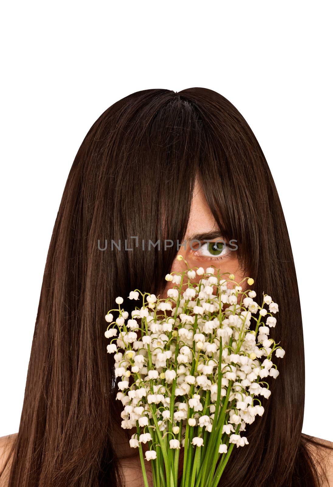 Woman holding lily of the valley in the hand