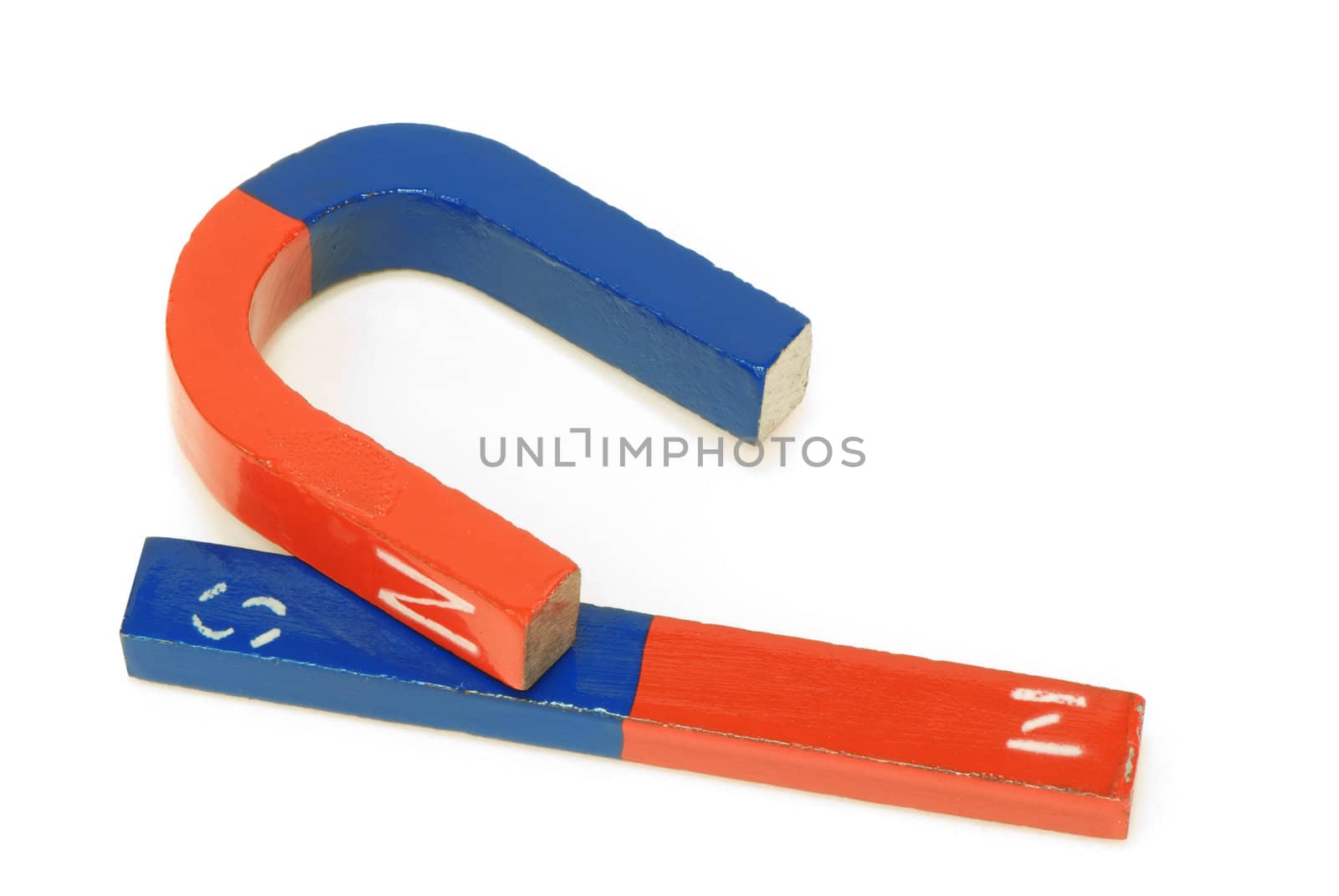two red and blue magnets on white background