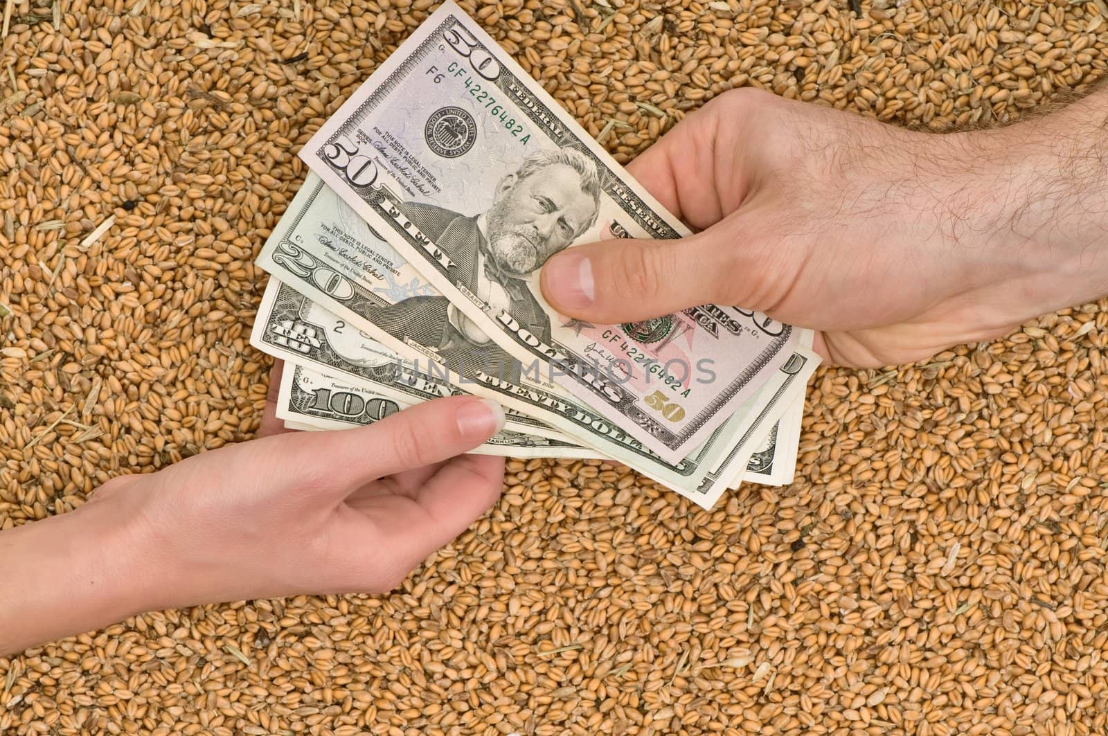 deal between businessman and businesswoman