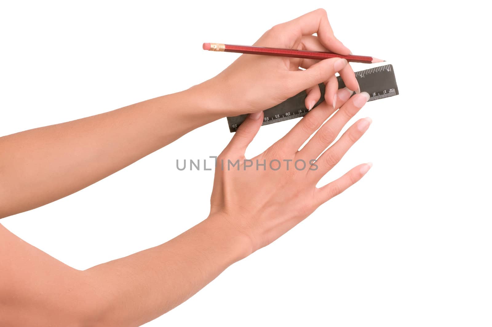 Woman draws line with rule and pencil