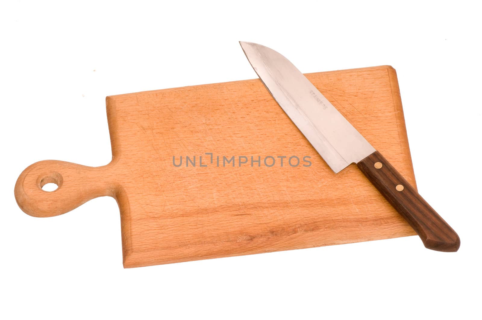 the board for meat with knife on the kitchen