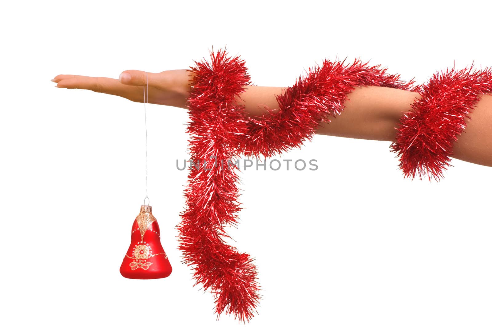 Christmas-tree decorations in the hand on white background