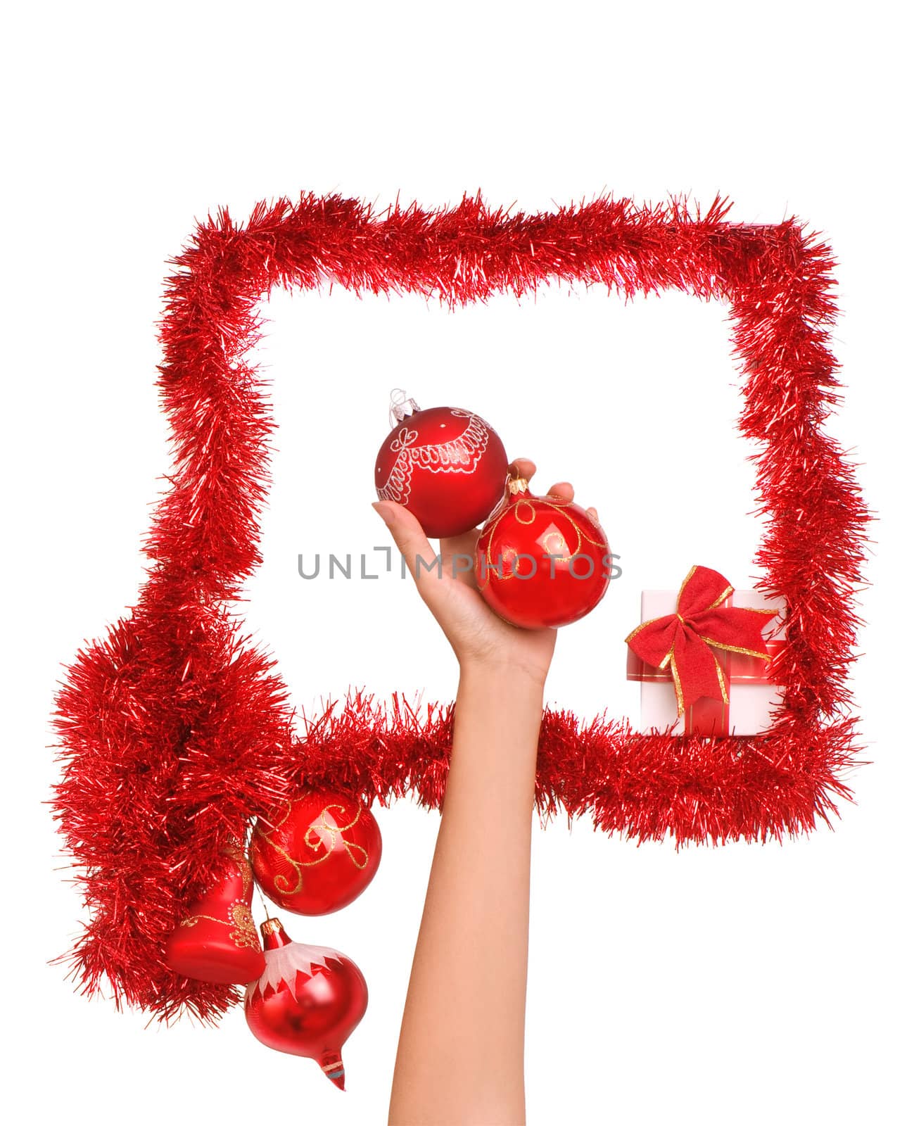 Frame decorated with Christmas-tree decorations