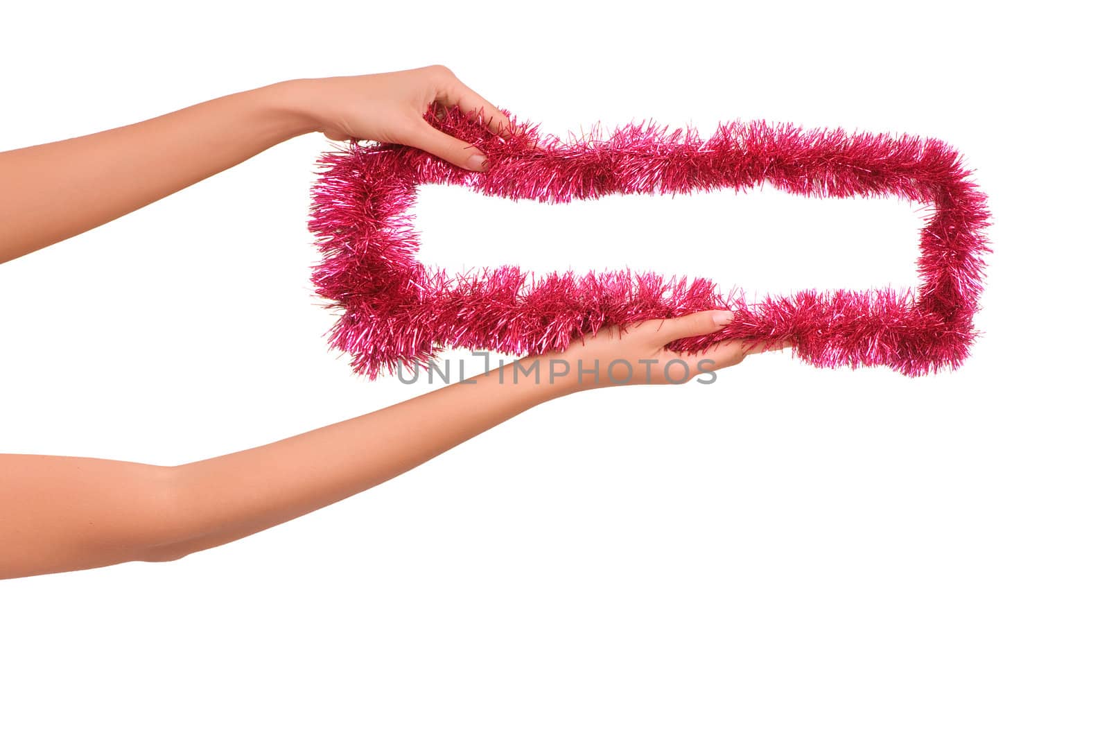 Frame decorated with Christmas-tree decorations in the woman's hands
