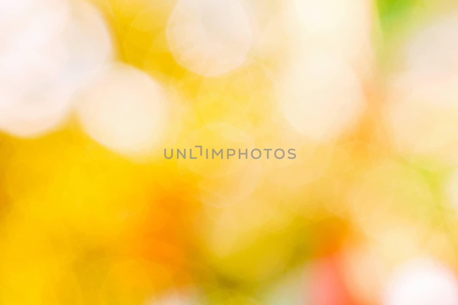 Christmas abstract. Blurred yellow glare. Beautiful bright background