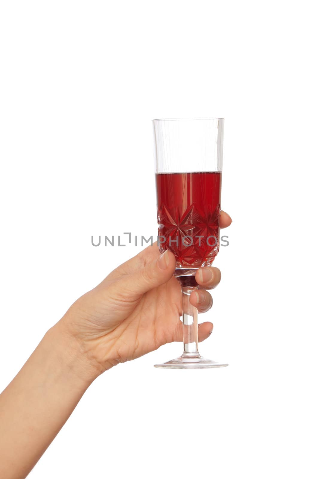 woman holding glass with red wine on the party