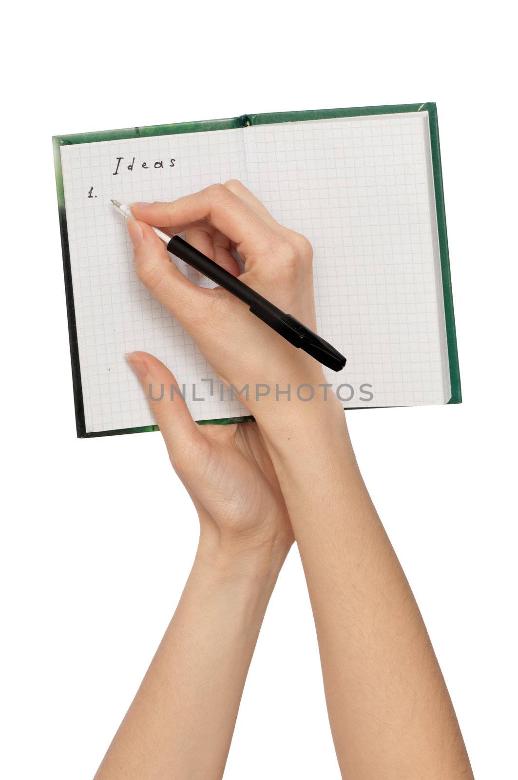 business woman writes ideas for business plan