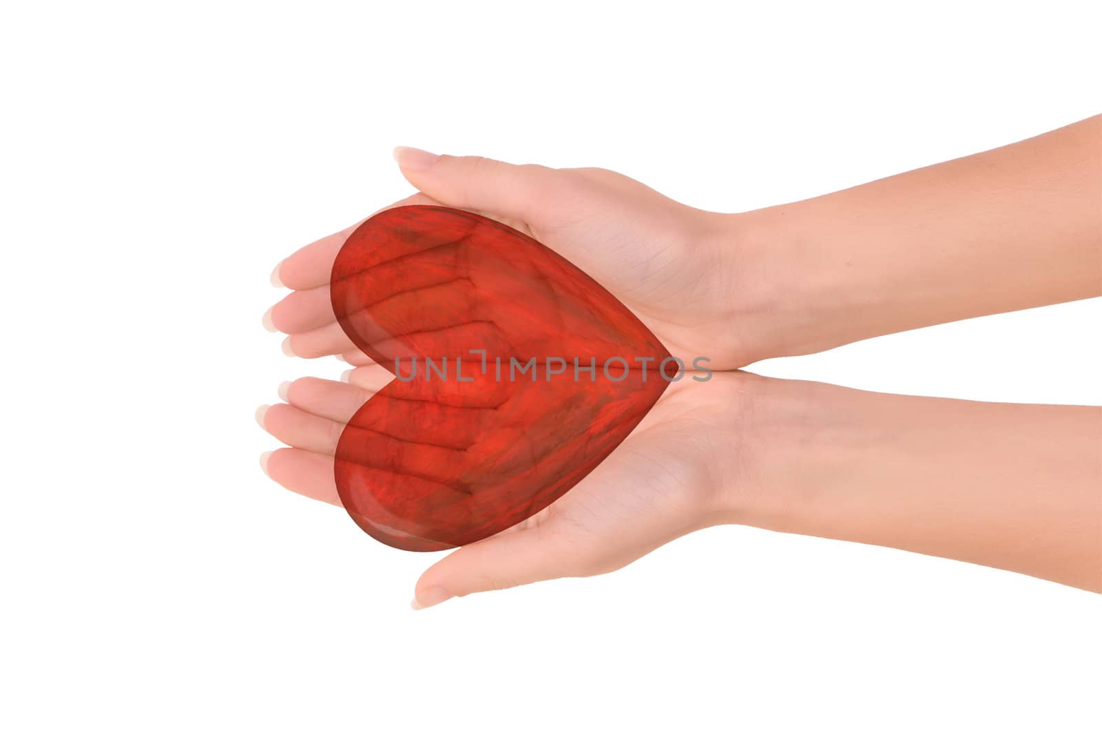 Woman holding red heart in the hand