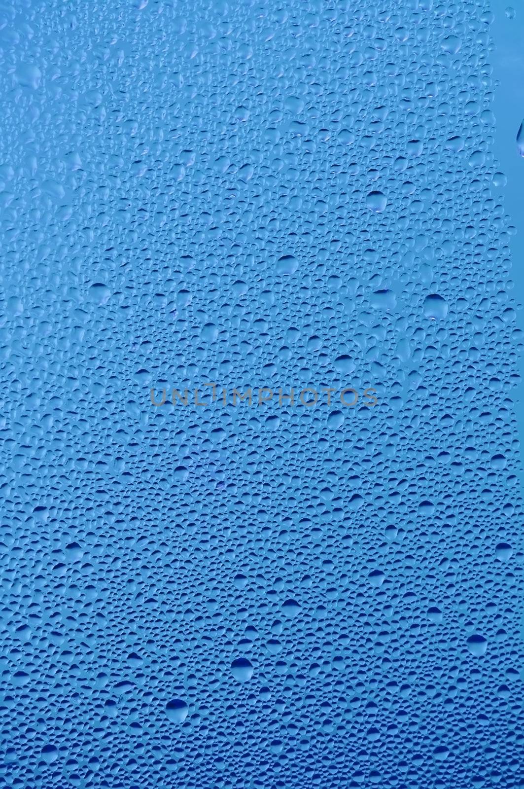 Water raindrops on the window after rain for background