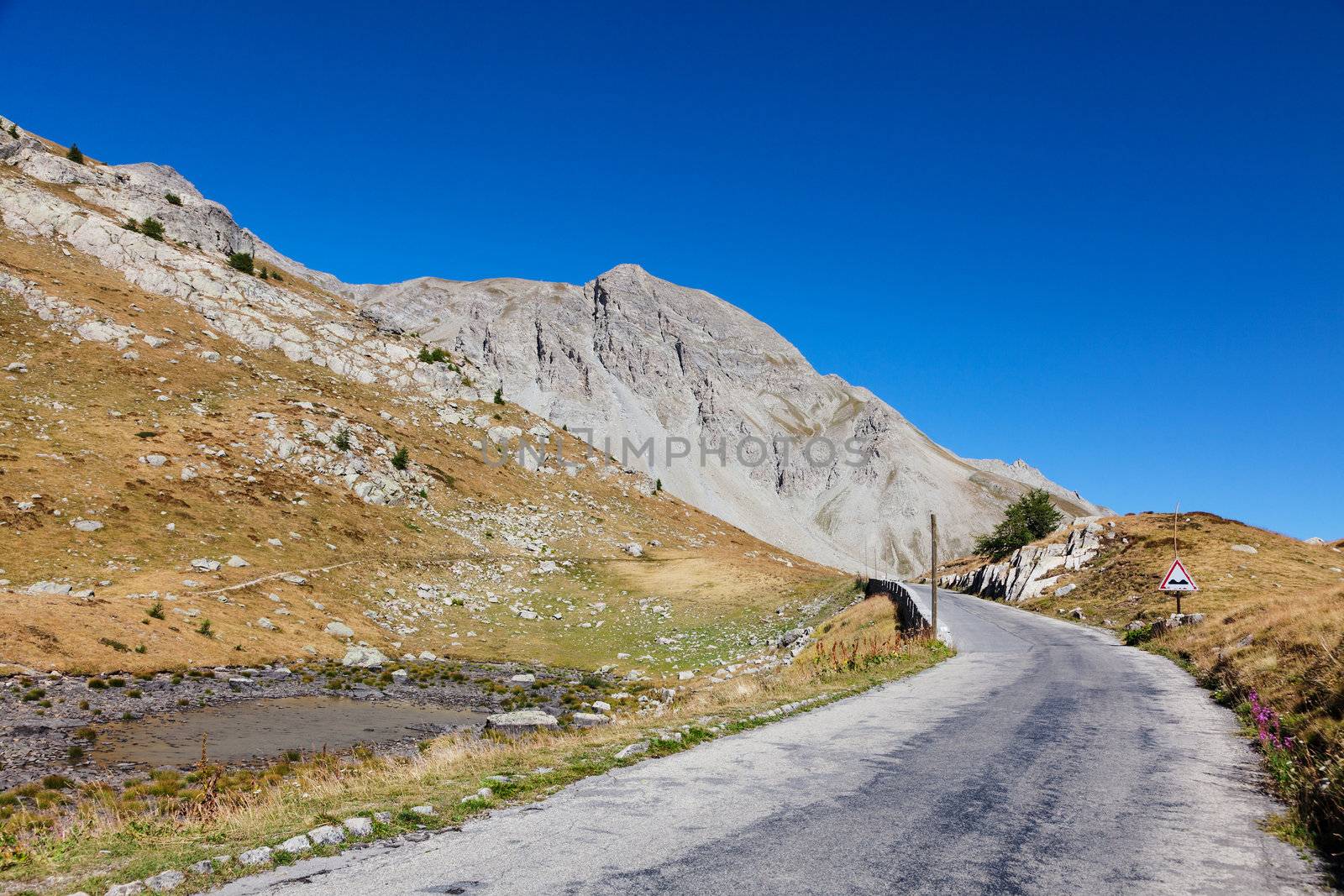 Image of the road to Col de la Cayolle ( 2326 m) located in the Southern French alps in Alpes-de-Haute-Provence department.
