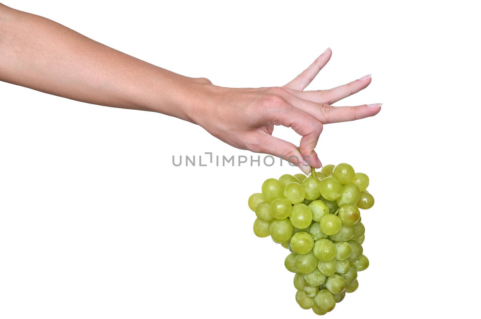 a brunch of green grape in the woman's hand