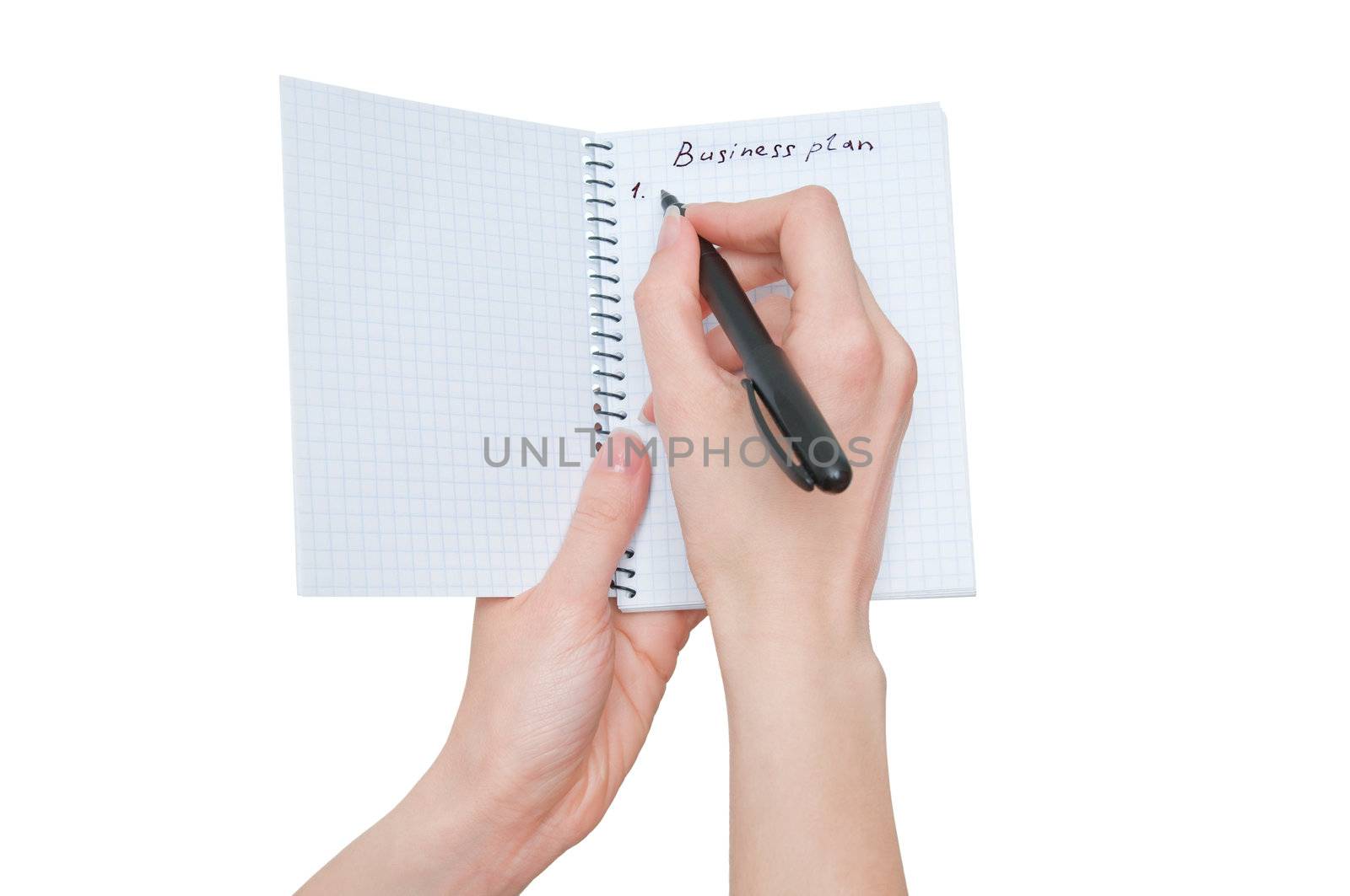 business woman writes business plan on white background