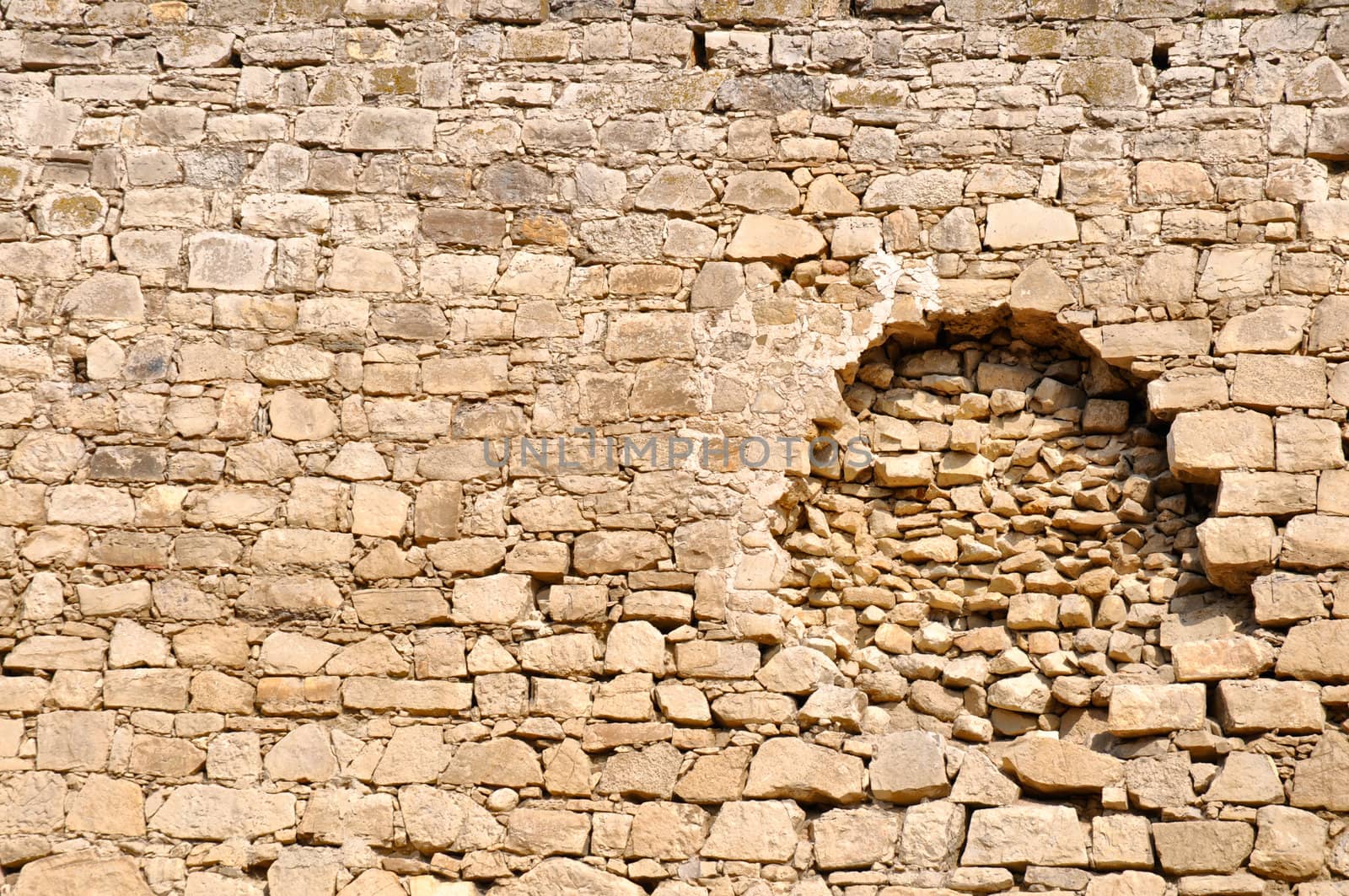 Big hole in the old wall of defensive fort