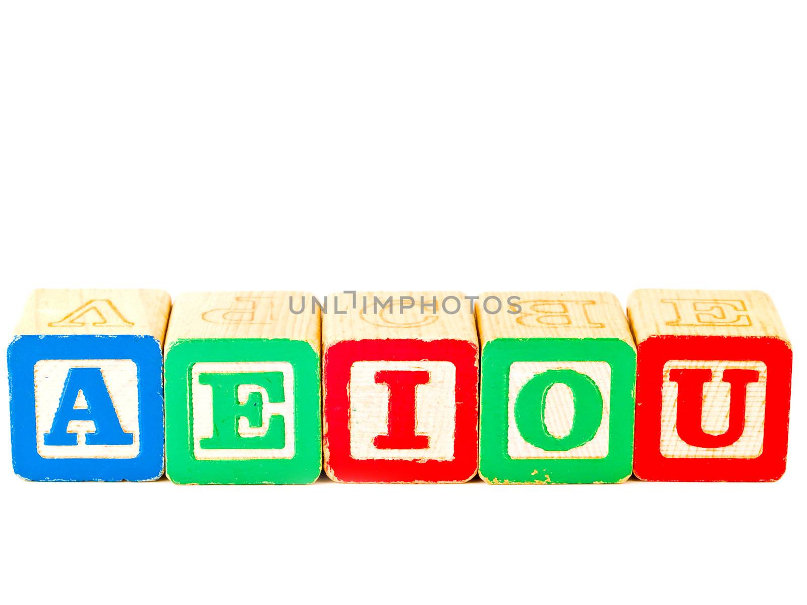 Colorful Alphabet Blocks With All of the Vowels