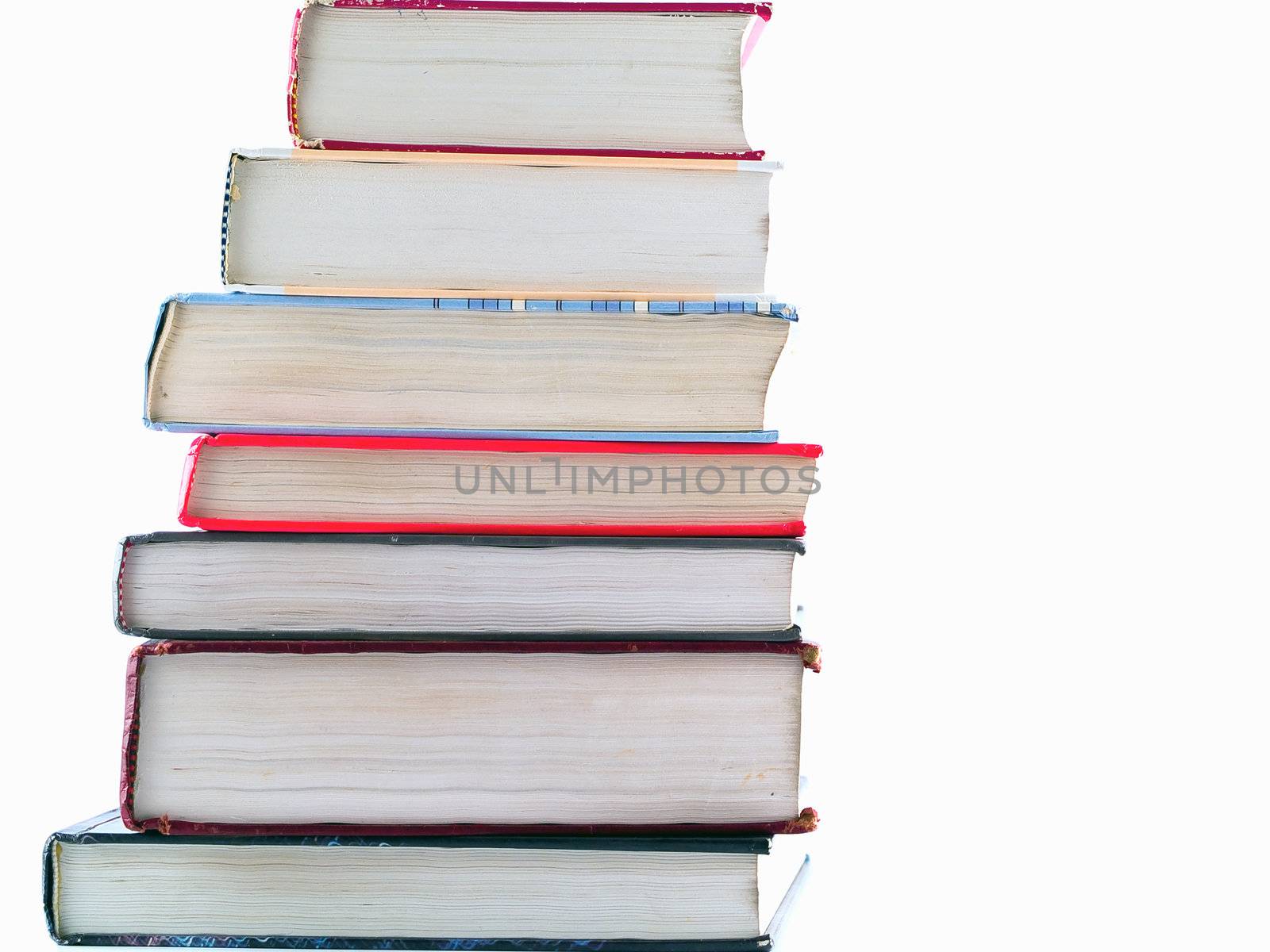 Old Textbooks stacked on a blank background