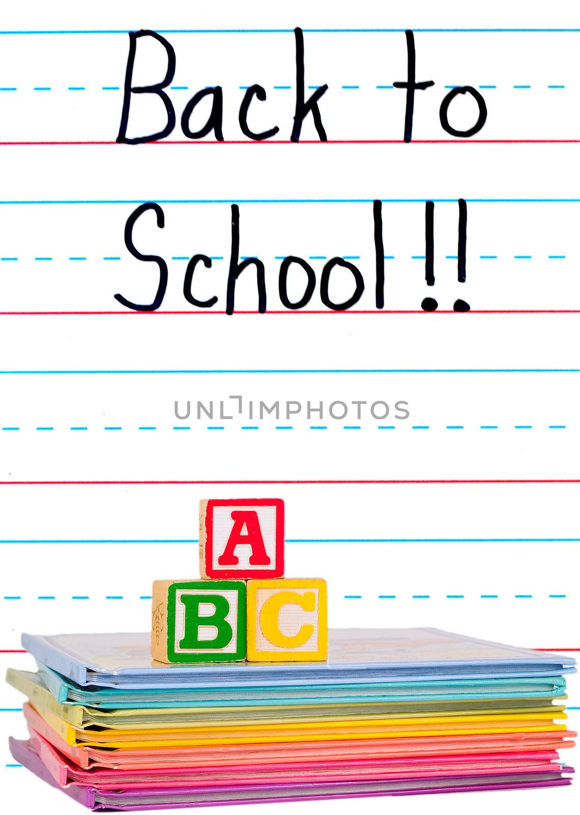 Back to School Written on a Lined Dry Erase Board with Books
