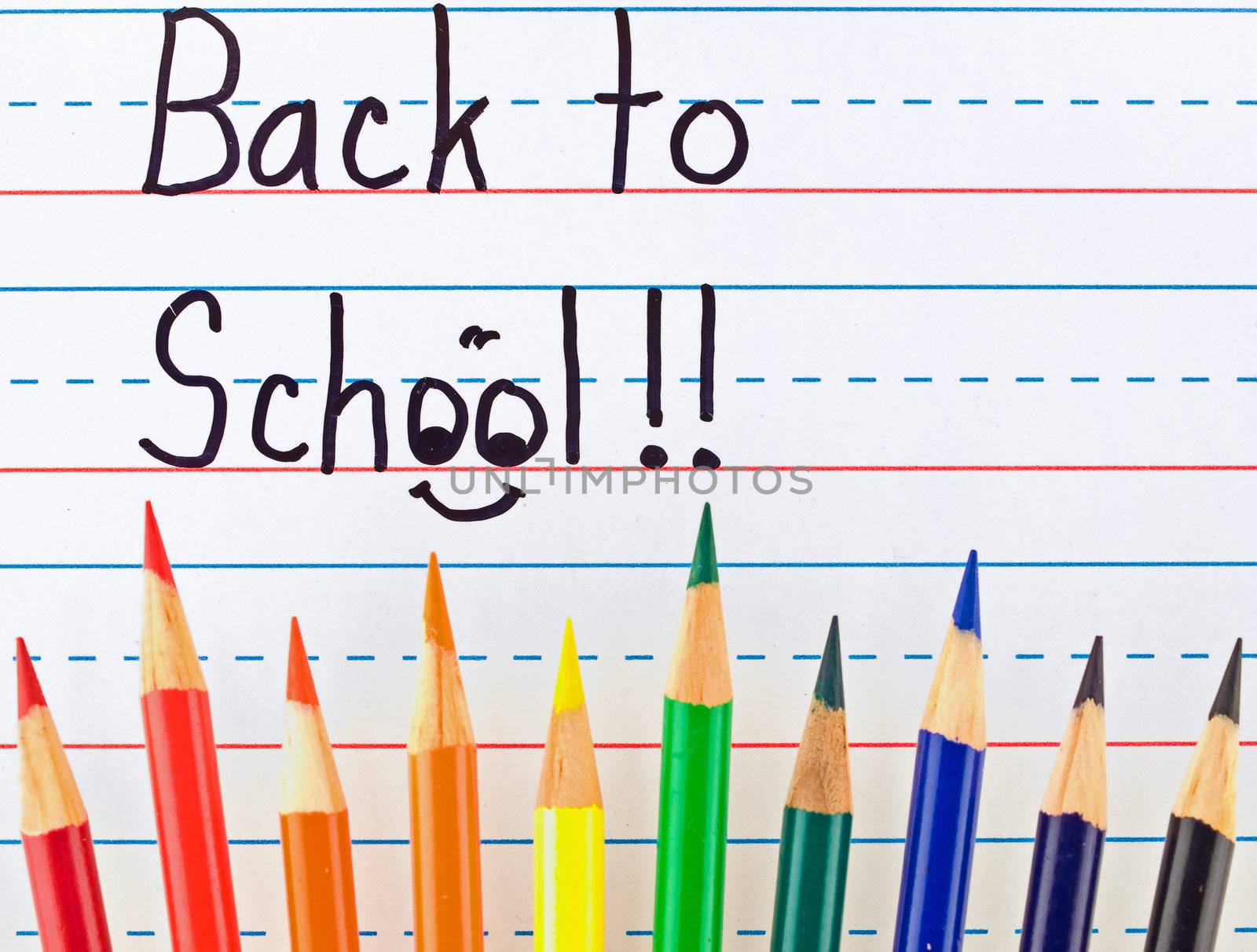 Back to School Written on a Lined Dry Erase Board with Colored Pencils by Frankljunior