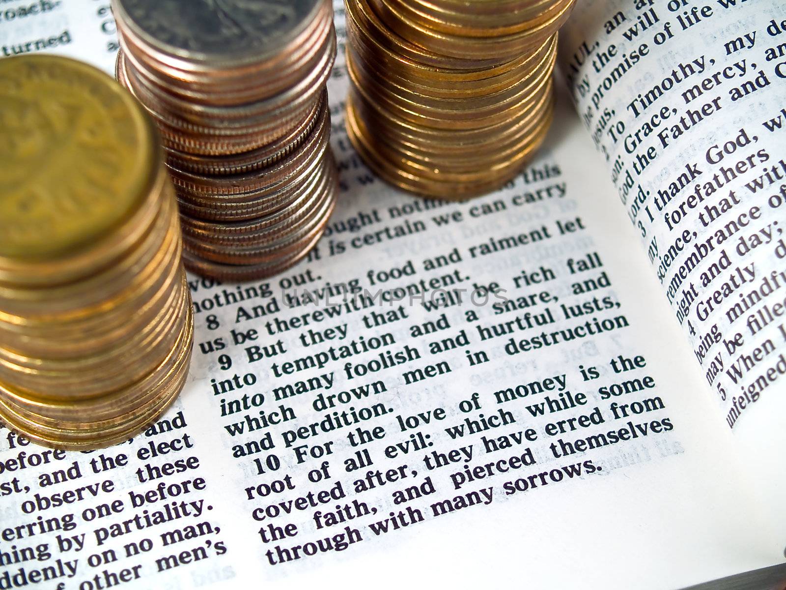 The Bible opened to I Timothy 6: 10 Love of Money