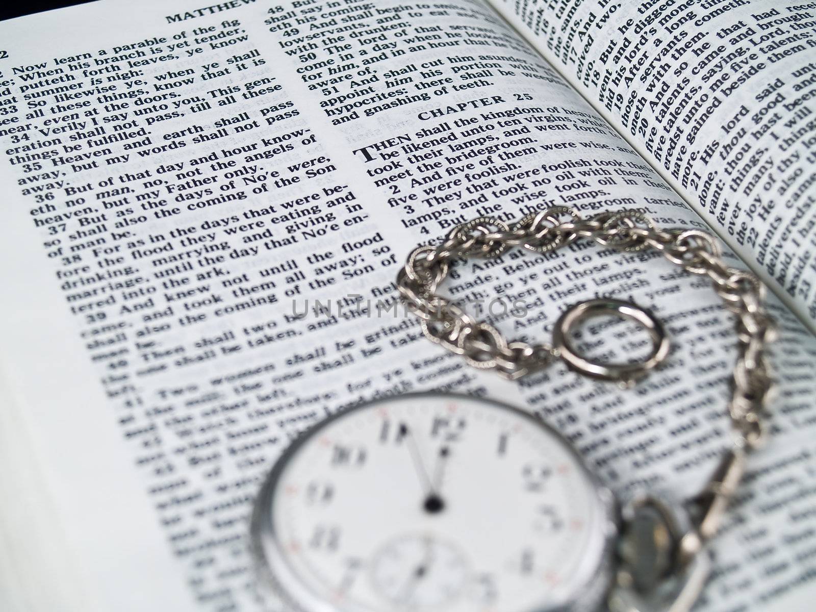 The Bible opened to Matthew 24: 36 with a Pocketwatch by Frankljunior