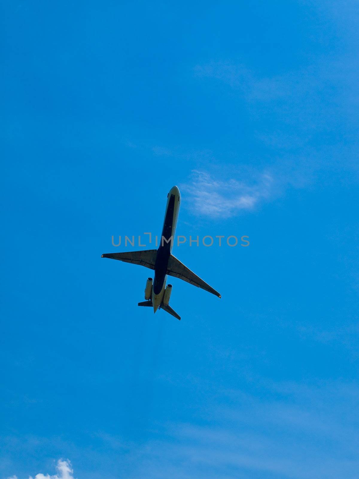A Commercial Airliner Taking Off into a Partly Cloudy Blue Sky by Frankljunior
