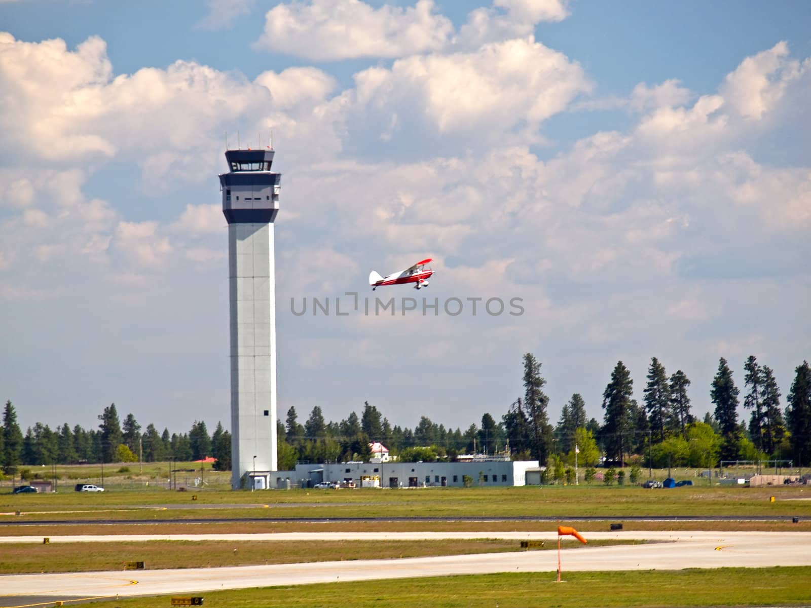 Air Traffic Control Tower of a Modern Airport with Aircraft Taking Off by Frankljunior