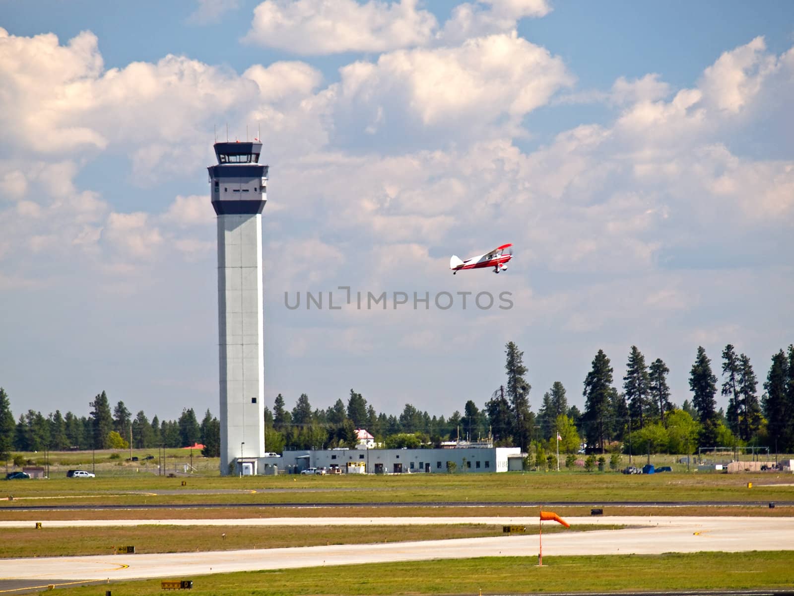 Air Traffic Control Tower of a Modern Airport with Aircraft Taking Off by Frankljunior